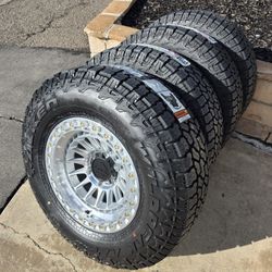 17" LOCK rims w/ 33" Falken Wildpeak AT4 tires.  $1860