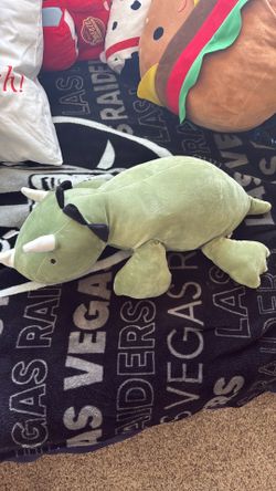 Weighted plush dinosaur