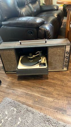 Vintage GE portable stereophonic record player with pull down Garrard Turntable