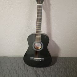 Black acoustic guitar