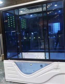 BATHTUB, SAUNA AND JACUZZI WITH BLUETOOTH AND PHONE CONTROLLED LIGHTS WITH MUSIC