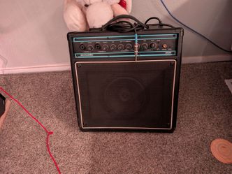 Acoustic AG30 Guitar Amplifier Chromebook and a Nikon camera