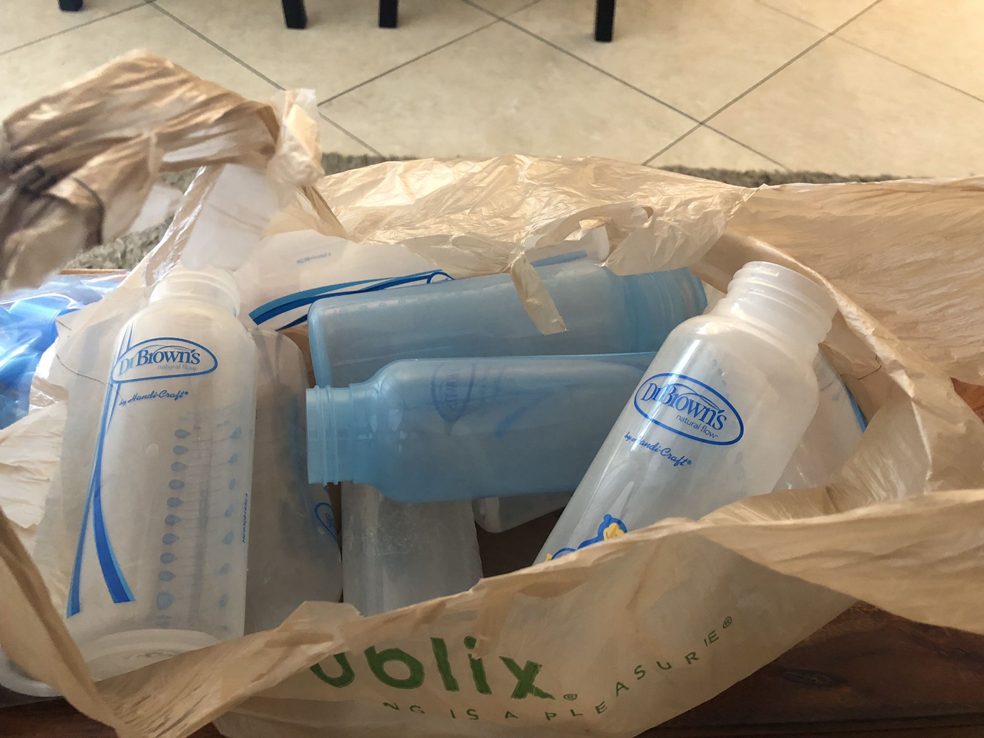 Free 12 Dr Browns baby bottles and parts.