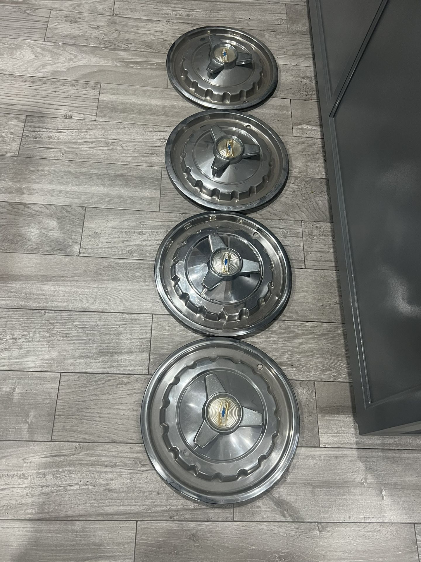 1957 CHEVY BEL AIR NOMAD OEM HUBCAPS