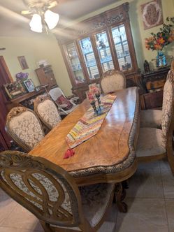 Beautiful all solid about 9 ft tall with extension. Six chair. Also that is matching china cabinet