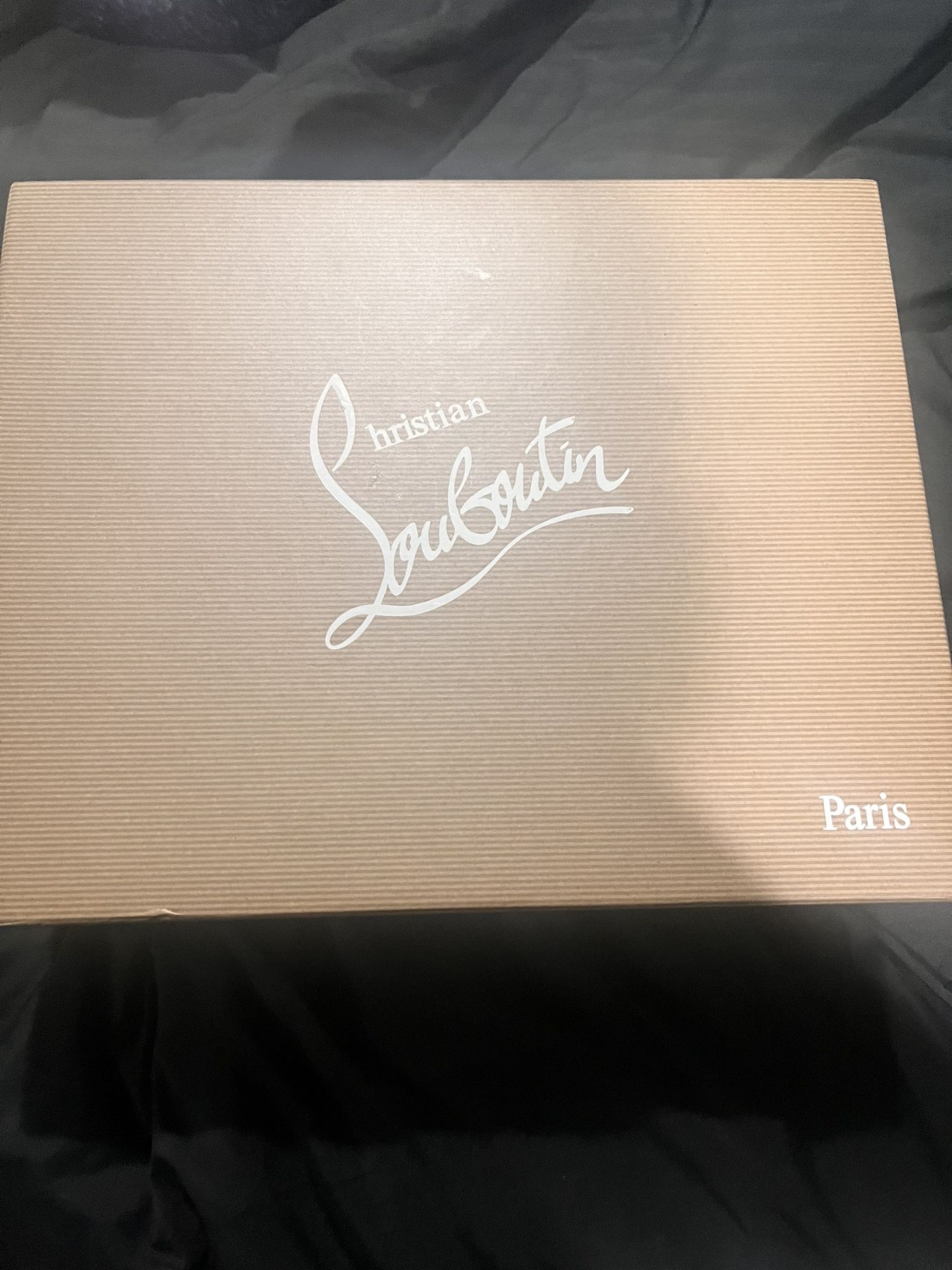 christian louboutin red bottom high tops