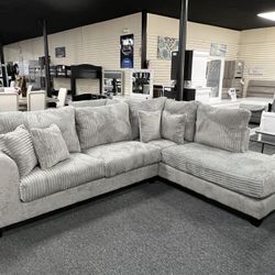 New Light Gray Sectional. Pillows Included. Delivery Available 