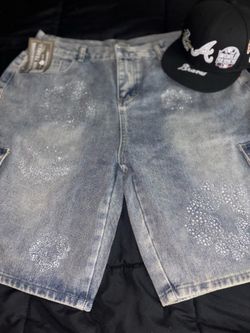 Denim tears shorts and new era hat