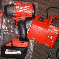 Milwaukee M18 1/2. High Torque Impact Wrench Charger and high output 6.0 Battery ..NEW