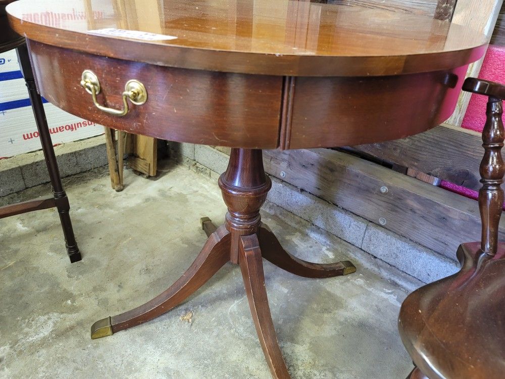 Mersman Round table With Drawer.
29.5w X 27.75h