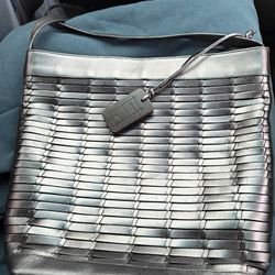 The CEM Metallic Woven Leather Silver Bucket Style Shoulder Bag