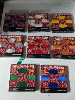 Gift tie ribbon dispensers 8 total 8 different colors.