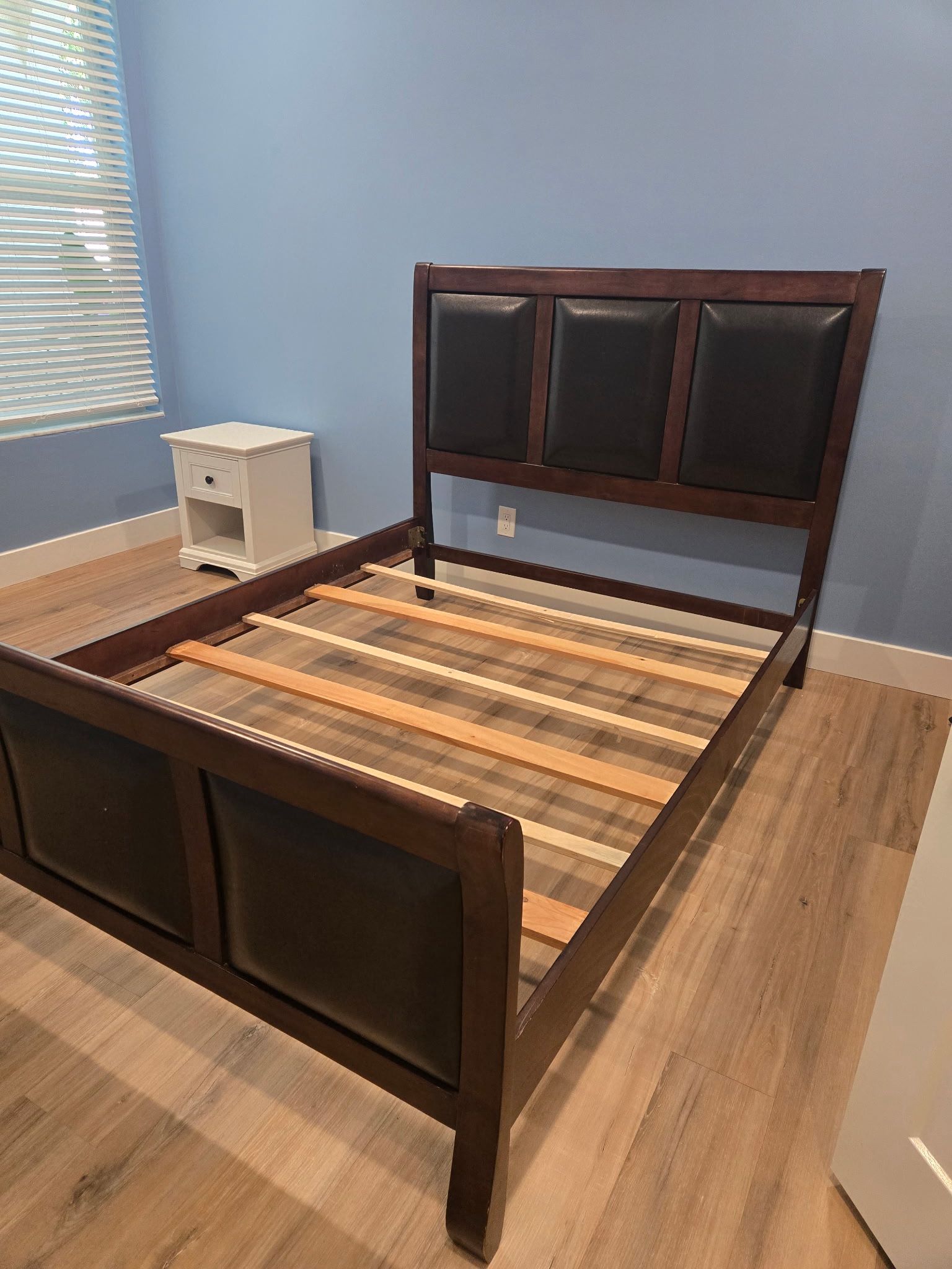 Wood and leather bed frame