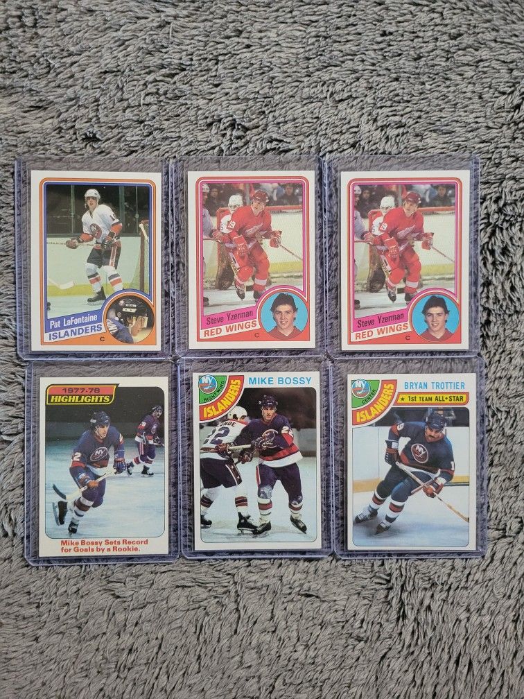 Vintage 70s & 80s Hockey Featuring Two 1984 Topps Steve Yzerman Rookie Cards, Pat LaFontaine Rookie & Hall of Famer Mike Bossy Rookie Card.