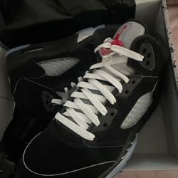 Women Size 7 Metalic 5s