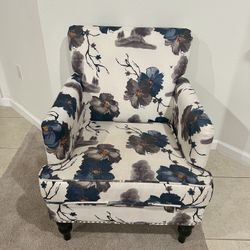 Floral tufted club chair