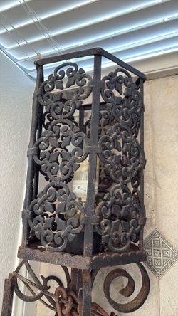 Two matching very heavy, heavy metal wall hanging lanterns