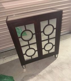 Black and mirrored shelf