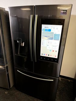 Samsung family hub black stainless steel refrigerator and bottom freezer