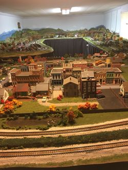 Large ho scale model railroad includes engines rolling stock structures and scenery details!