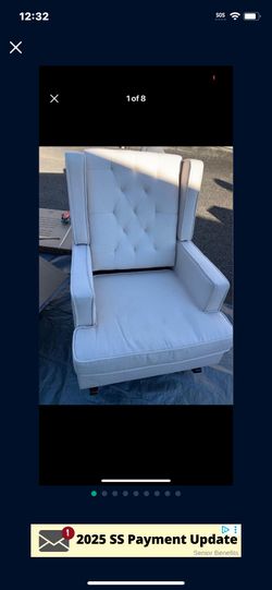  a beige fabric rocker chair   Great condition