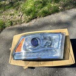 Stock 2013 Ram Pick Up Passenger Side headlight  