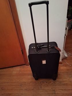 Black carry-on roller suitcase.