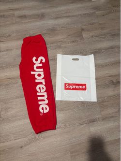 Red Supreme sweat pants