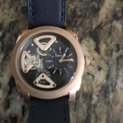 Fossil watch rose gold copper color and blue band