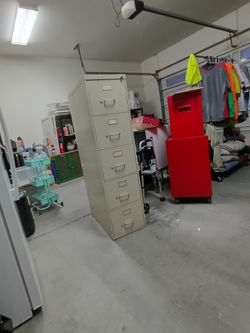 Five drawer letter size filing cabinet 28 in deep. Drawers work smoothly. No key. Cash only please