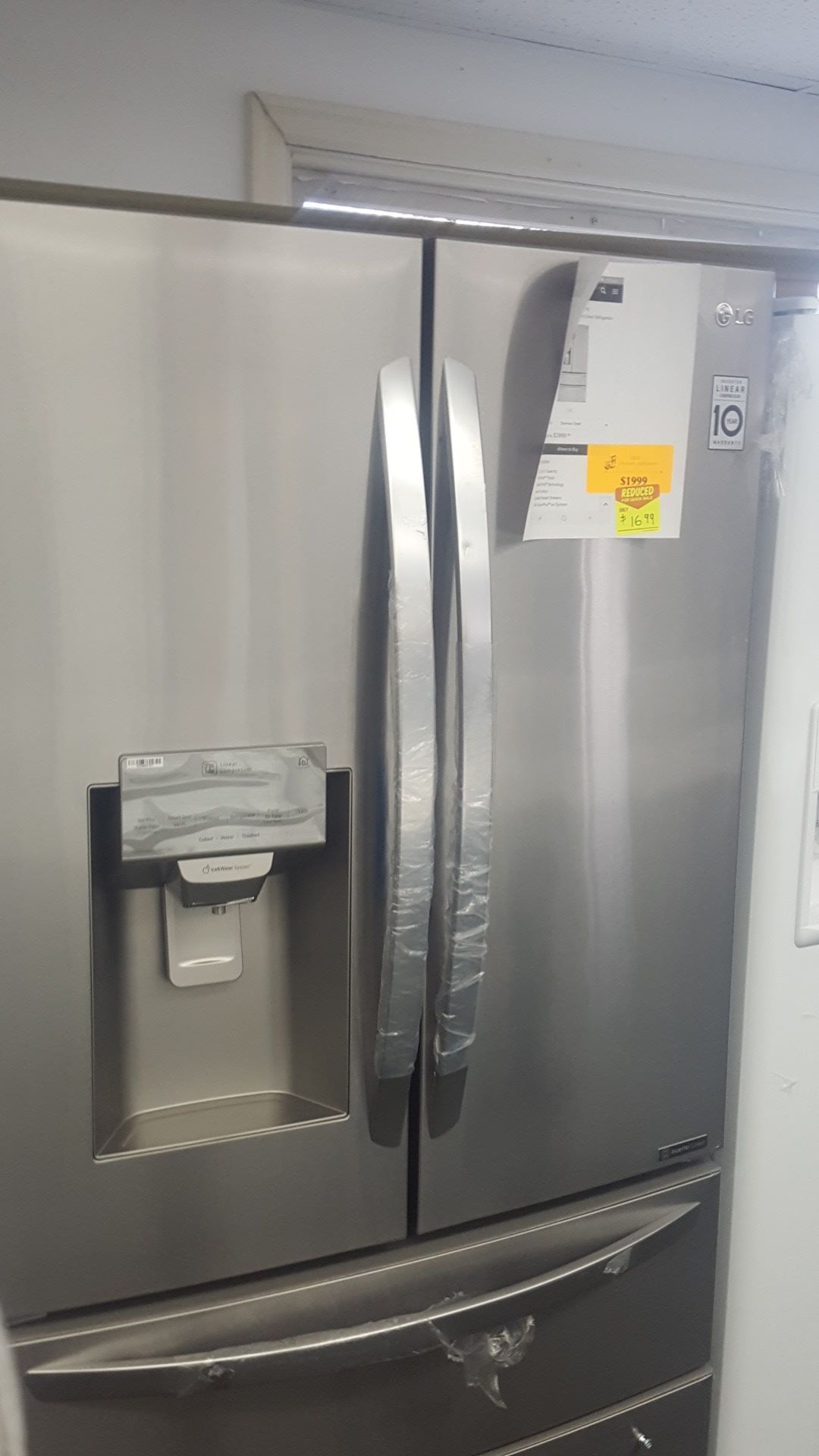 LG French door refrigerator with dual freezer drawer