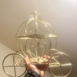 Decorative gold carriage could be centerpiece