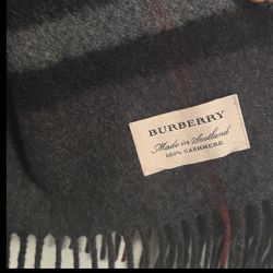 Burberry scarf Charcoal.
And black, a hundred percent cashmere made in scotland
