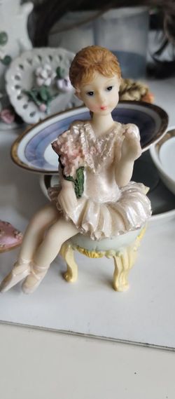 Seated Ballerina Figurine with Flowers