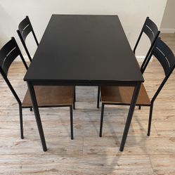 IKEA Dining Table + 4 Chairs (Black/Brown) – Good Condition
