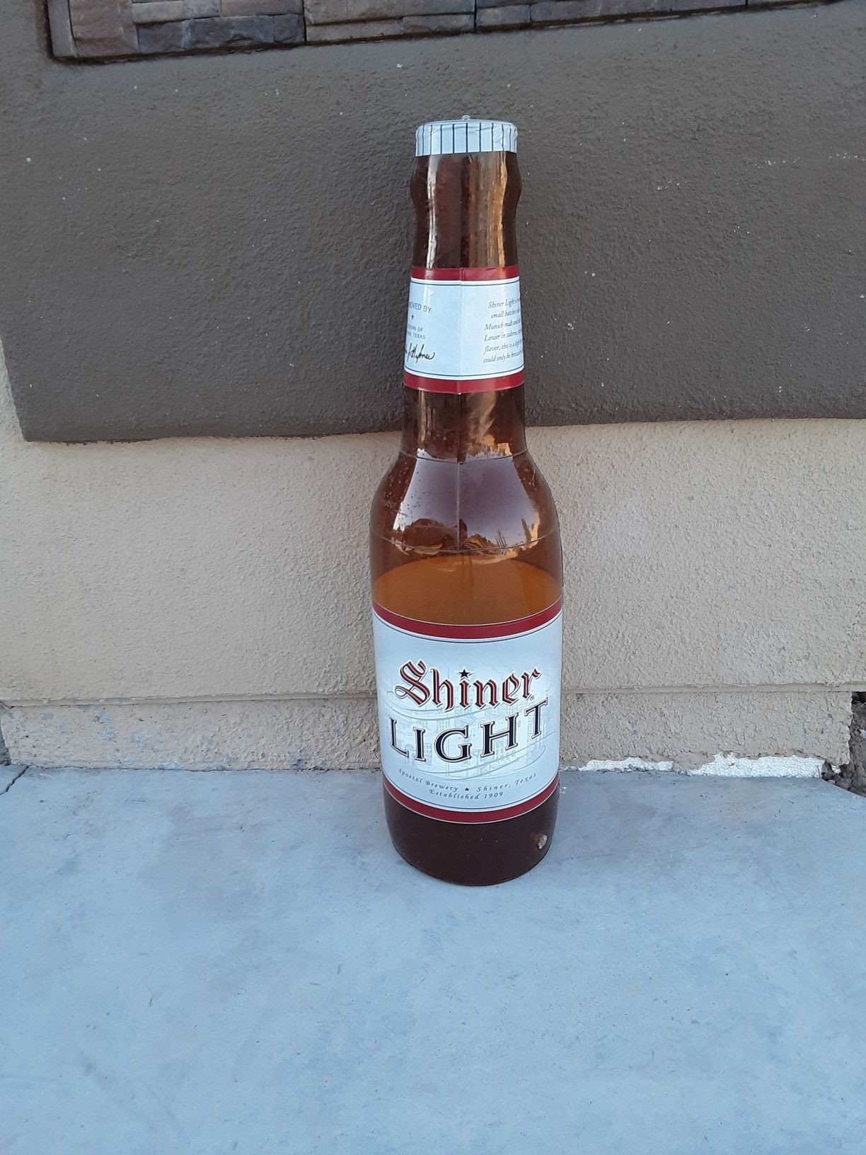 Shiner Light inflatable bottle balloon.