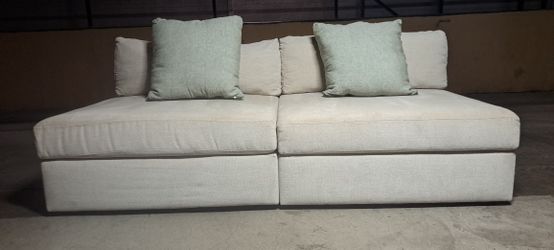Living Spaces 2 Piece Armless Modular Sofa.