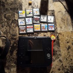 Nintendo DS blue with 13 games and bag