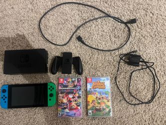 Nintendo Switch (Console + Accessories + 2 Games)
