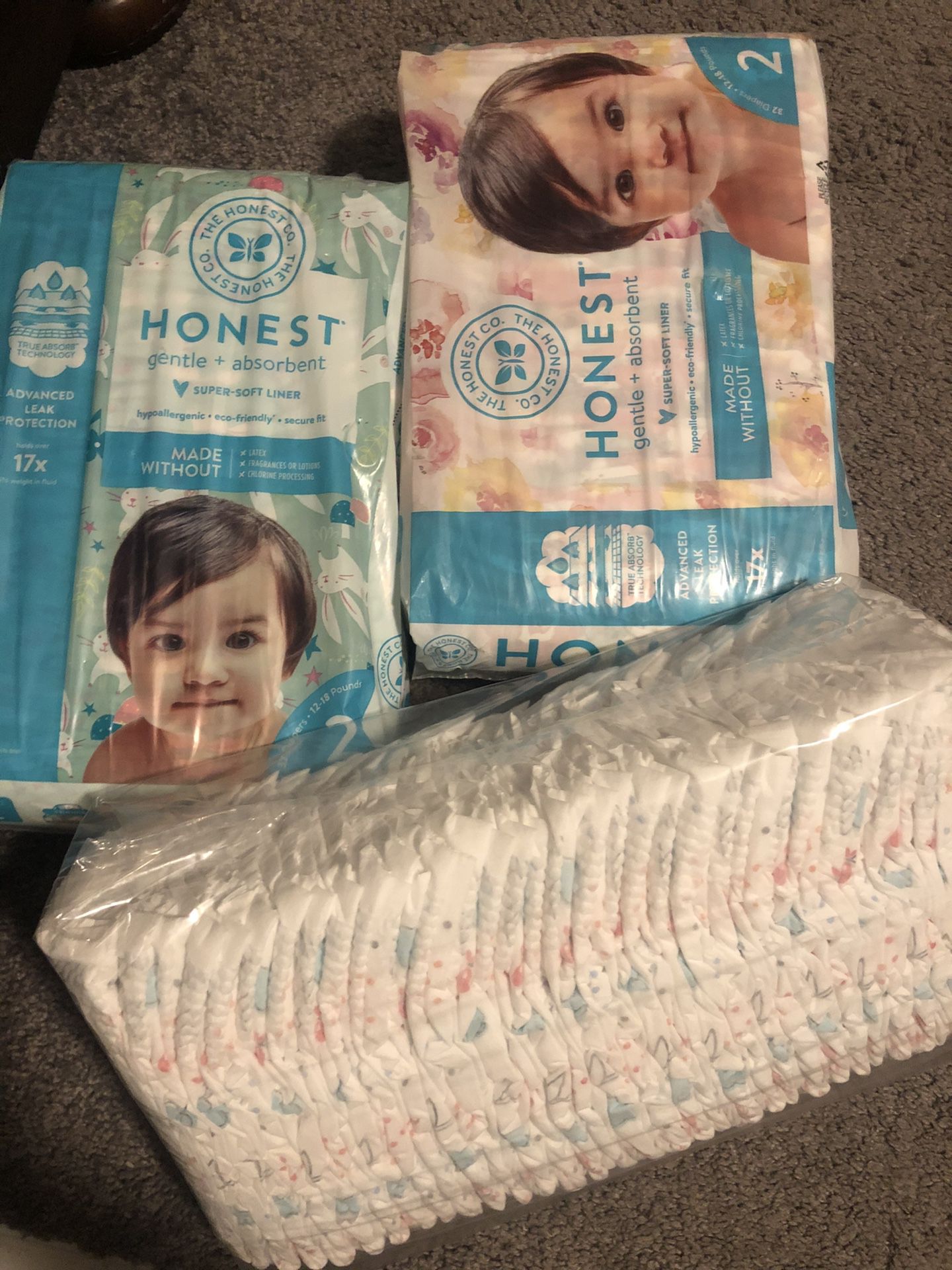 Size 2 diapers (the honest company & huggies)