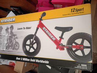 Brand New in box Strider 12" Balance Bike 18 month to 5 years Retails 140.0p