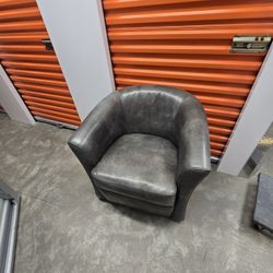 Dark Grey Leather Swivel Armchair