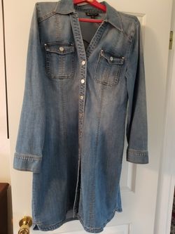 Knee-length denim jacket.
