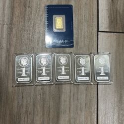 2.5g Gold.     5oz Silver.      $250 Ea