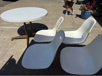 Mid century table and vintage chairs