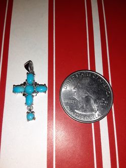You .sterling silver turquoise cross
