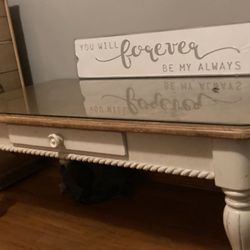 Living Room Table With Glass And Sign