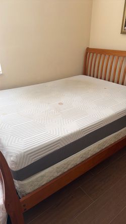 Queen mattress with box spring .
