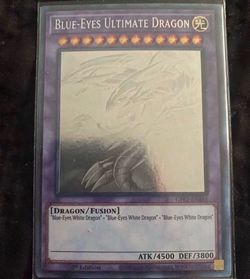 NM-Blue-Eyes Ultimate Dragon (Ghost Rare)