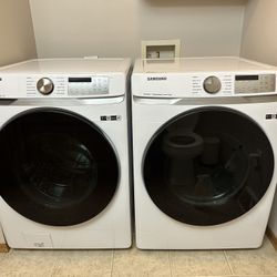 Samsung 4.5 cu. ft. Smart Washer and 7.5 cu. ft. Dryer w/ steam and sanitize (stackable) LIKE NEW